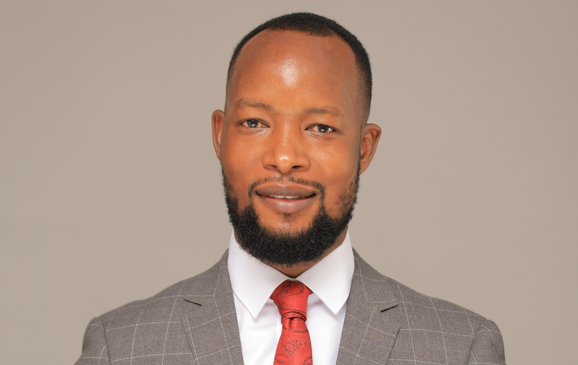 Abraham Luzzi speaking on government reforms in Kampala