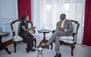 President Ruto and Truphena Muthoni planting a tree at State House